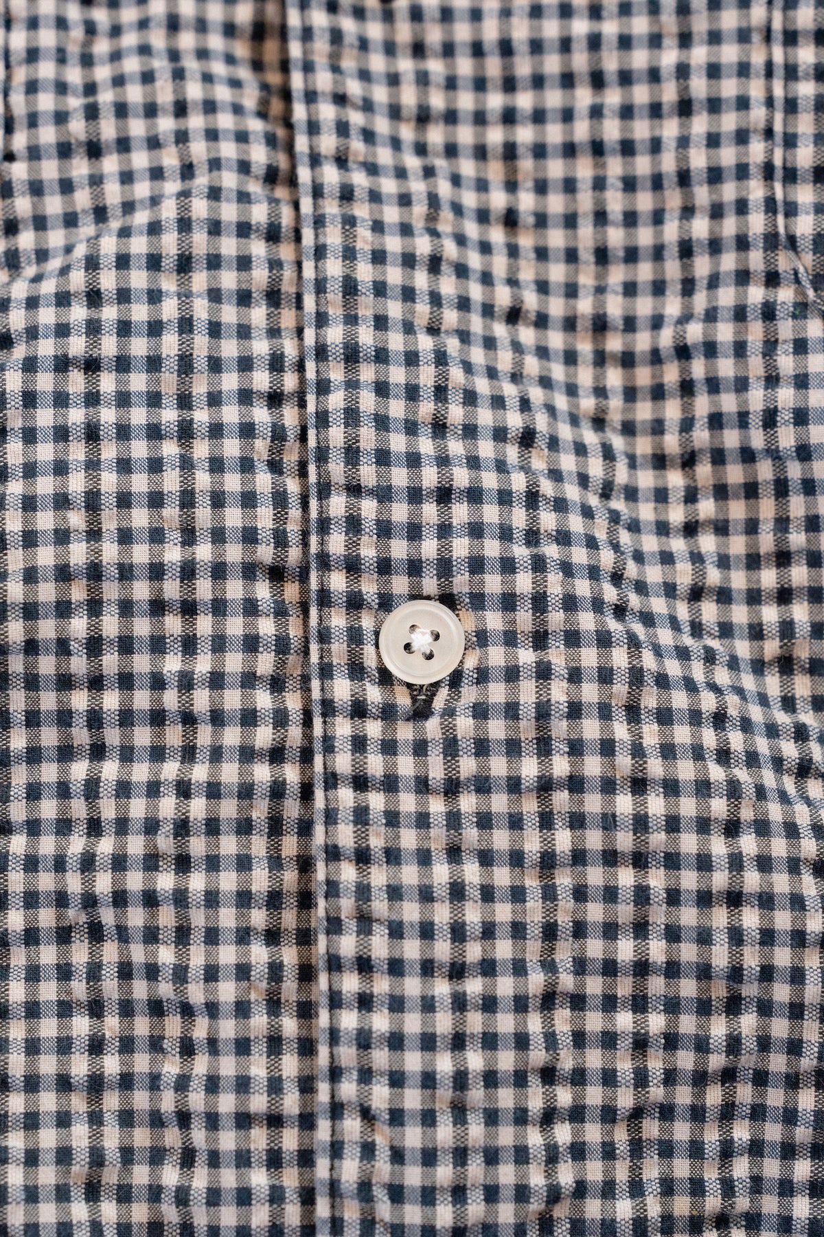 Button and placket of the NYC Shirt, close up